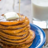 These pumpkin pancakes taste like pumpkin pie in pancake form. They're wonderfully smooth in the center. Creamy, dreamy, delicious! | natashaskitchen.com