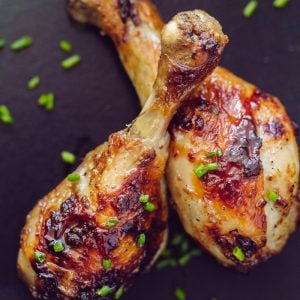 Tender, juicy baked chicken drumsticks with a crisp, salty skin. Marinade has only 4 ingredients. Mom's method makes these chicken drumsticks finger-lickin' good! | natashaskitchen.com
