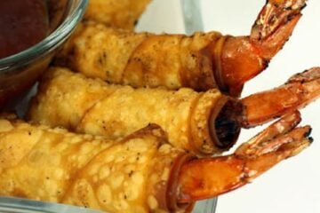 These Shrimp Spring Rolls taste as good as they look! Watch your guests' eyes get big when you serve up this appetizer. Delicious!