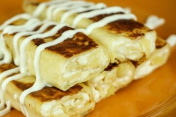Pineapple here is sweet and tart; a perfect complement to the cheese filling in these nalesniki. Enjoy nalesniki topped with sour cream or favorite jam.