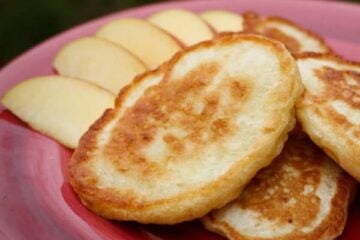 These buttermilk pancakes are commonly&nbsp;referred to as "oladi" but we called them "blinchiki" growing up. They are loaded with diced apples. Yum!