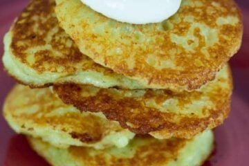 These potato pancakes have finely grated, raw potatoes and onion. It's a classic Ukrainian dish called Deruny. Our moms still make these deruny regularly.