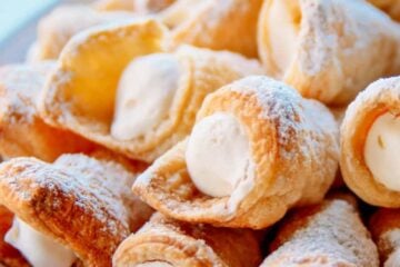 These puff pastry cream horns are easy and impressive for any special occasion! This is my Mother's cream horns recipe (aka trubochki).