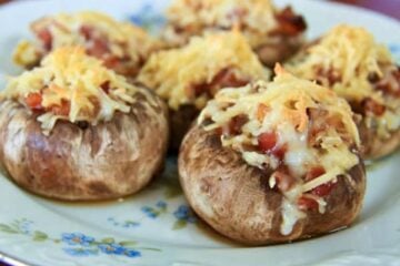 These mushrooms are stuffed with a mix of cheeses, bacon and onion and are baked to perfection. This recipe is quite scrumptious!
