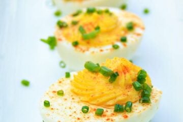 These dressed eggs are super easy to make! If you have way too many Easter eggs in your fridge, this stuffed eggs recipe is for you.