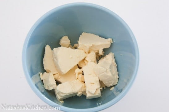 A blue bowl with cows cheese 