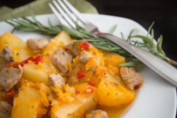 These braised potatoes taste just like I remember them from childhood; really good! There's a fun ingredient in here; diced pimiento peppers. Easy to make!