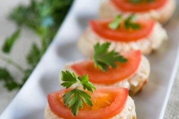 These Gouda and Tomato Tea Sandwiches (crostini) are really easy to throw together. The spread keeps well in the fridge so you can make it ahead of time.