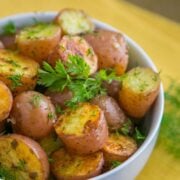 These Oven Roasted Baby Red Potatoes are crisp on the outside and perfectly seasoned. Great potato side dish for any menu. This recipe impressed my parents.