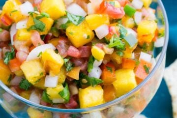 Not only this Fresh Peach Salsa is it yummy as an appetizer with chips, it's also really good as a topping for fish or pork; who would have thought?