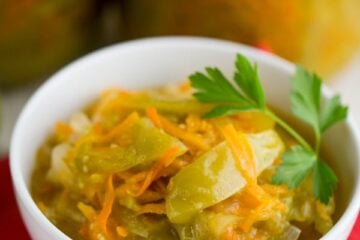 Green tomatoes in this canned green tomato salad are marinated and made into a salad with carrot and onion. They taste tangy and sweet. Give them a try.
