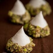These Meringue Acorns are a real show stopper and taste heavenly. Vanilla meringue surrounded by melted chocolate truffles and covered with salty nuttiness.