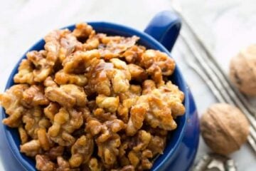 These caramelized, candied walnuts are quite a treat. Toss them into your salad, over popcorn, or straight into your mouth. Crunch. Crunch.