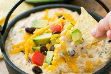 This Southwest hot chicken dip is cheesy, loaded with corn, black beans, and has just the right amount of heat from the jalape&ntilde;os. Enjoy one pot recipe!