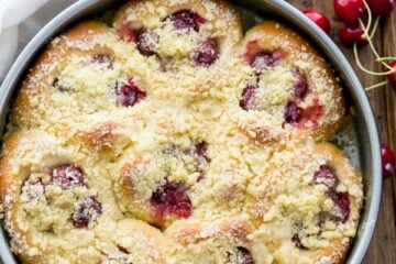 These sweet cherry filled buns (vatrushki) are soft&nbsp;and&nbsp;fluffy. They kind of melt in your mouth and you won't be able to stop at just one.