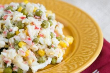 Crab salad on a yellow plate