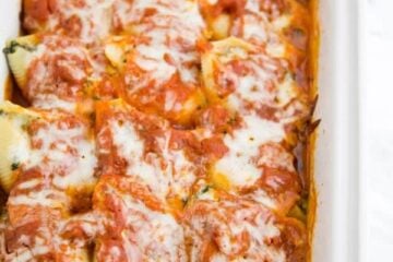 These lasagna stuffed shells are easier than making lasagna but are just as satisfying! @natashaskitchen