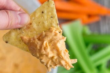 buffalo chicken dip on a tortilla chip