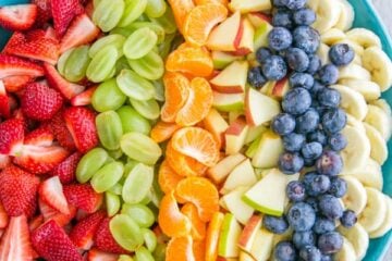 This Fruit Salad with Orange Poppy Seed Syrup is so easy & perfect for parties! @natashaskitchena