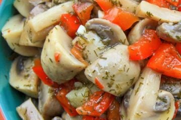 A bowl with marinated mushrooms