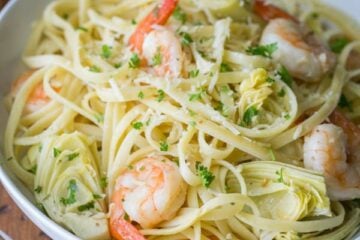This shrimp and artichoke linguine is a 30-minute meal! It has a fresh and light lemon herb sauce - DELICIOUS!! | natashaskitchen.com