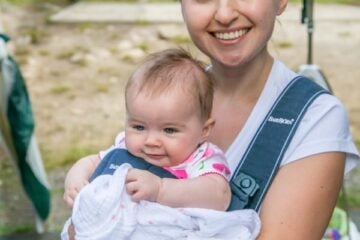 Natasha holding her baby daughter