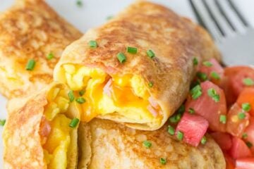 Egg, Ham and Cheese Crepes Pockets - Our son's favorite breakfast and they are freezer friendly! | natashaskitchen.com