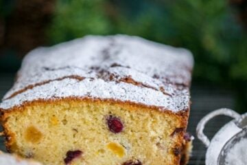 This sweet cranberry apricot loaf made our house smell like Christmas morning. It is soft, moist, crumbly and loaded with tang of cranberries and apricots.