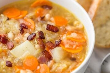 This sauerkraut soup is a most unusual and delicious soup. The sauerkraut gives it a lovely texture and zing. It's hearty, filling and will warm your belly | natashaskitchen.com