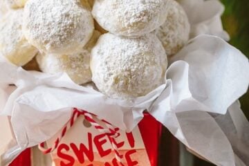 These almond snowball cookies just melt in your mouth. Perfect Christmas cookies since they look like darling little snowballs.