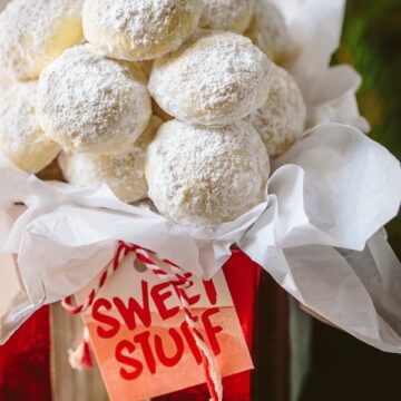 These almond snowball cookies just melt in your mouth. Perfect Christmas cookies since they look like darling little snowballs.