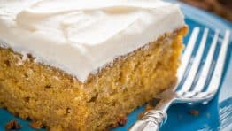 This Easy Pumpkin Cake is done in 4 steps (with frosting)! The moist, delicate crumb and marshmallow-like whipped cream cheese frosting is irresistible!