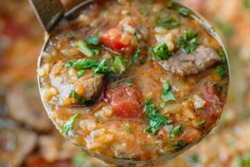 Beef Soup Kharcho: a hearty beef and tomato soup with a unique spice blend and plenty of fresh herbs. The tender beef in this beef soup melts in your mouth.