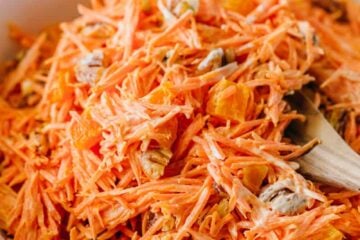 A simple and tasty carrot salad studded with apricots and pecans. The dressing in this carrot salad is delicious - you'll want it on all of your salads!