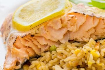 This oven baked glazed salmon recipe has a well-seasoned, tangy crust and it's so easy to make. The glaze seals in the wonderful juices in this oven baked salmon.