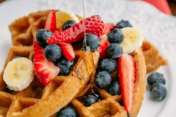 These whole wheat and blueberry waffles are really really good! We love them with real maple syrup and raspberry sauce and pile on all kinds of fresh fruit.