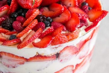 A close up of a mixed berry and angel food trifle
