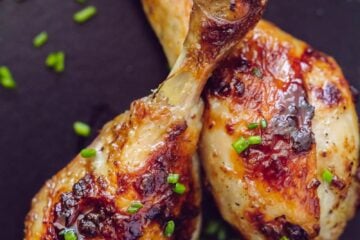 Tender, juicy baked chicken drumsticks with a crisp, salty skin. Marinade has only 4 ingredients. Mom's method makes these chicken drumsticks finger-lickin' good! | natashaskitchen.com