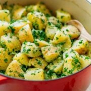 Parsley potatoes in red pot