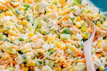This chicken pasta salad is loaded, hearty and satisfying. The creamy lemon dill dressing adds fresh amazing flavor. This pasta salad is so tasty! | natashaskitchen.com