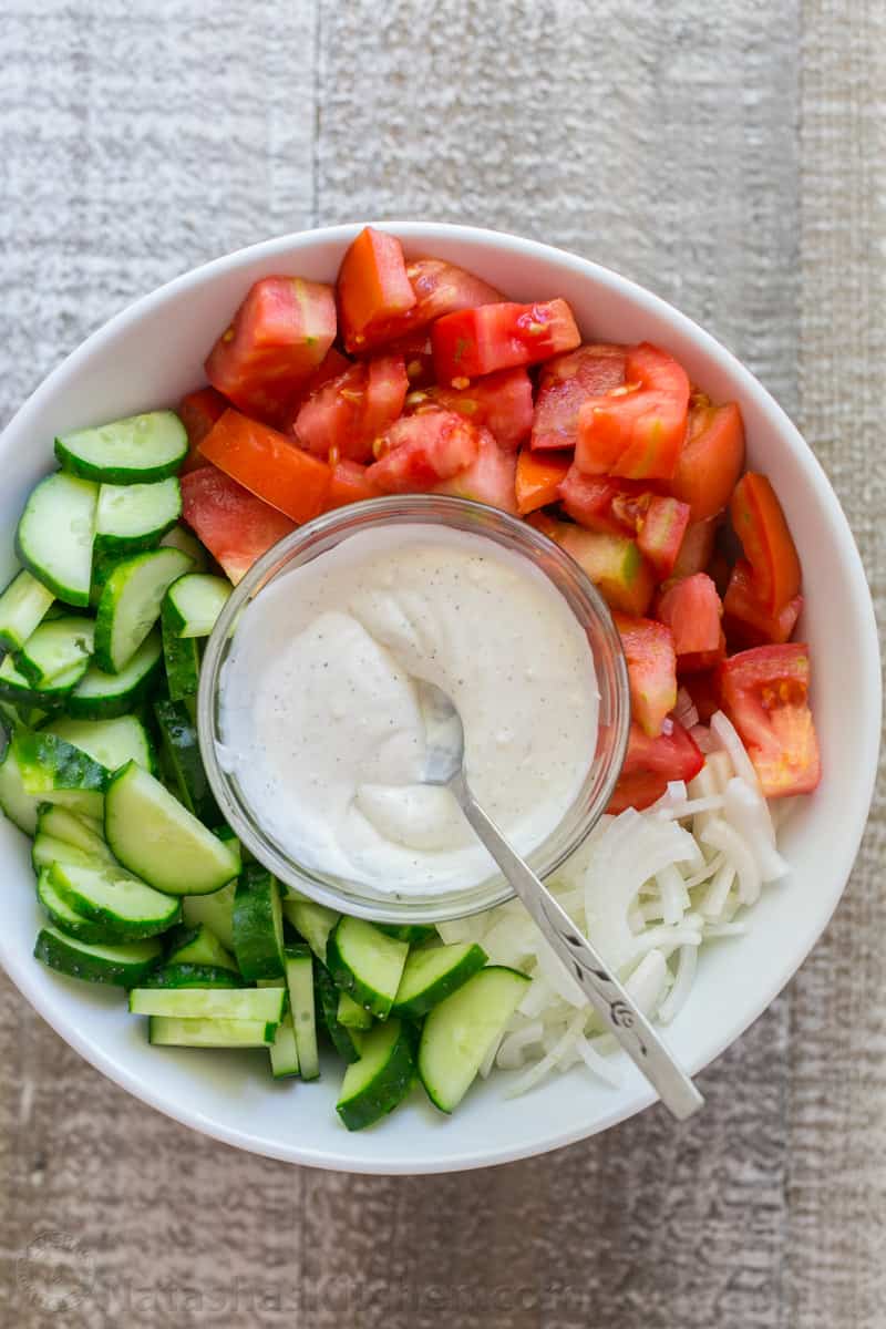 Cucumber and tomato salad with creamy dressing