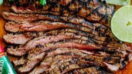 Go-to flank steak recipe! The marinade is so easy with just a few ingredients. This chipotle flank steak has incredible flavor and the SECRET ingredient is... | natashaskitchen.com