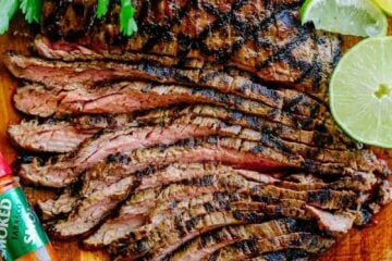 Go-to flank steak recipe! The marinade is so easy with just a few ingredients. This chipotle flank steak has incredible flavor and the SECRET ingredient is... | natashaskitchen.com