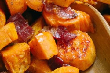 Maple Roasted sweet potatoes with bacon and serving spoon