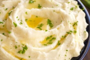 These creamy mashed potatoes are shockingly good! Learn the secrets to the best mashed potatoes recipe. Whipped, velvety and holiday worthy mashed potatoes! | natashaskitchen.com
