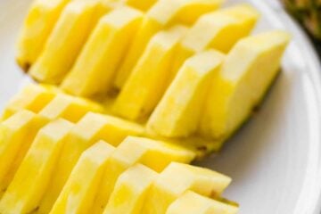 The prettiest and easiest way for How to Cut a Pineapple! Learn how to make pineapple boats for your next party and impress your friends! A video tutorial | natashaskitchen.com