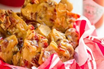 This Candied Bacon Brittle is loaded with nuts and candied bacon. It's unusual but CRAZY GOOD! Candied Bacon Brittle is a wonderful homemade gift idea! | natashaskitchen.com