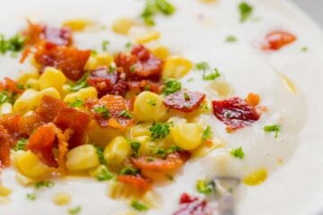 This creamy cauliflower soup is loaded with sweet corn and crunchy bacon. Creamy cauliflower soup has rich gourmet flavor and it's good for you! | natashaskitchen.com