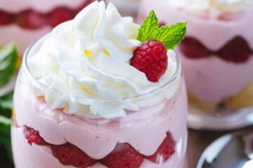 Raspberry Mousse Cups - an easy and impressive dessert and always a hit at parties! The sweet/tart raspberry mousse is bursting with fresh raspberry flavor | natashaskitchen.com