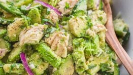 Avocado Tuna Salad in serving bowl with a spoon